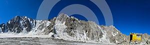 High mountain wall of Tian Shan, snow and glacier ice of Free Korea peak in Ala Archa, Korona Hut