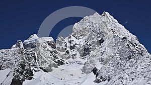 Snow covered peaks of Kangtega and Thamseku. High mountains in t