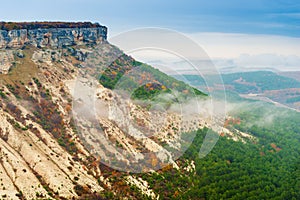 high mountaintops, a small cloud