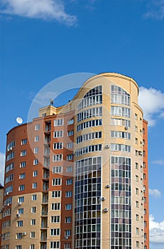 High multistory house of red and yellow bricks photo