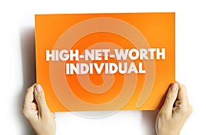 High-Net-Worth Individual is someone with liquid assets of at least $1 million, text concept on card