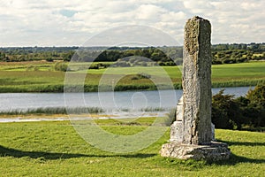 High North Cross and river shannon. Clonmacnoise. Ireland