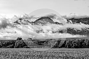 High peaks in the clouds. Black and white photography