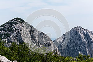 High peaks, ridges and forests on hillsides in mountains of Paklenica, Croatia
