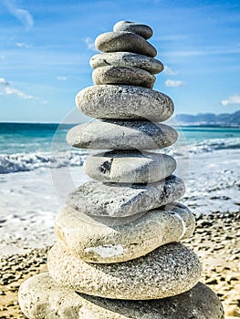 High pebble stack, sea in background