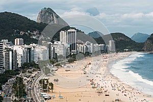 High perspective view of Copacabana Beach in Rio de Janeiro, Brazil with Sugarloaf mountain visible in the far background