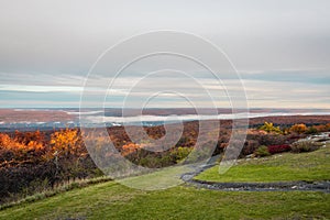 High Point State Park, NJ, overlooking tri-states with Matamoras, PA, and Port Jervis, NY, as fog rises over Delaware River on a l photo