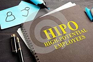 High-potential HIPO employees book. HR concept.