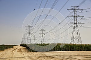 High Power Electric transmission grid lines in the desert.Dammam -Saudi Arabia