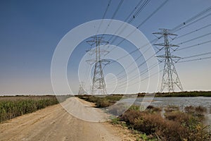 High Power Electric transmission grid lines in the desert.Dammam -Saudi Arabia