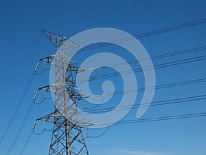 High power electricity post in blue sky