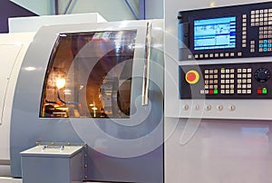 High precision CNC machining center working, operator machining automotive sample part process in factory