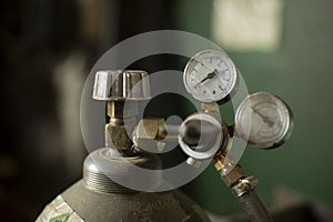High pressure cylinder. Tank with gas. Valve for pressure adjustment