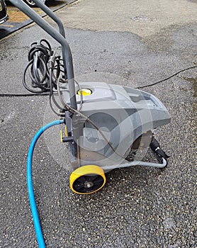 High pressure washer, insulates on concrete floors.