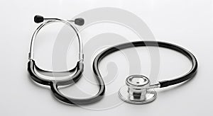 Black and Silver Stethoscope on White Background