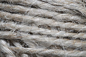 High-quality handmade coil made of natural hemp rope, isolated on a background