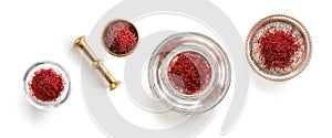 Saffron isolated in 4 different containers