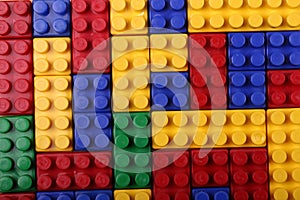High quality seamless background of colored plastic bricks