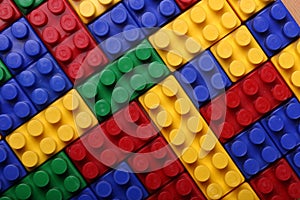 High quality seamless background of colored plastic bricks