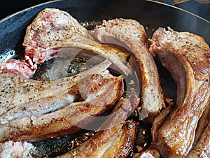 High quality top and lamp chops cooked in an ironcast pan