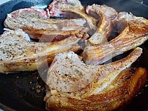 High quality top and lamp chops cooked in an ironcast pan