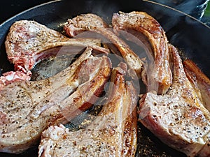 High quality top and lamp chops cooked in an ironcast pan