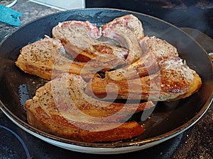 High quality top and lamp chops cooked in an ironcast pan