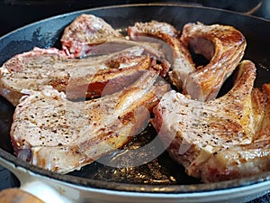 High quality top and lamp chops cooked in an ironcast pan