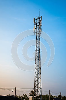 high radio tower againt blue sky