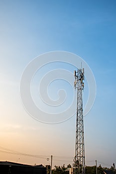 high radio tower againt blue sky