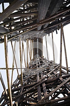 High railway bridge made of wooden typesetting beams