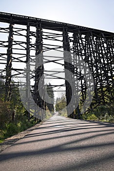 High railway bridge made of wooden typesetting logs