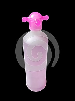 High Realistic Pink Bottle in Isolated Black Background Captured on High Angle.