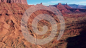 High Red Rock Butte Formation In Colorado Desert Valley Aerial Shot Bottom Up