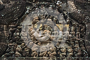 High relief sandstone carvings depicting monkeys in the story of the Ramayana at Angkor Wat Siem Reap Temple