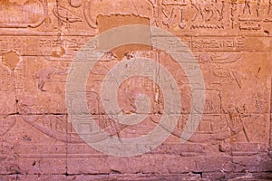 High Res ancient red limestone Egyptian relief with detailed figures on two khufu boats and hieroglyph