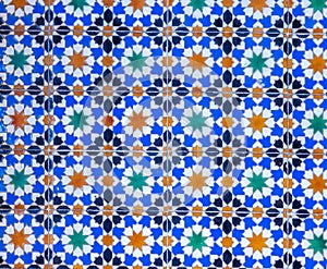 high res close up of historical vibrant colorful shining arabesque tiled wall in Cairo photo