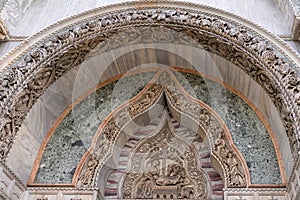 High res decorated white, gray and green tympanum and archivolt marble texture background photo