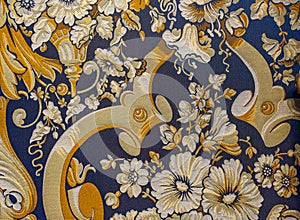 High res elegant dark blue with golden and cream embroider floral designs vintage victorian fabric wallpaper background