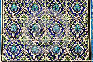 high res historical vibrant colorful shining floral and arabesque tiled wall in Cairo