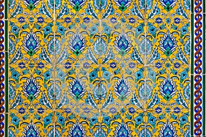 high res historical vibrant colorful shining floral and arabesque tiled wall from Egypt photo