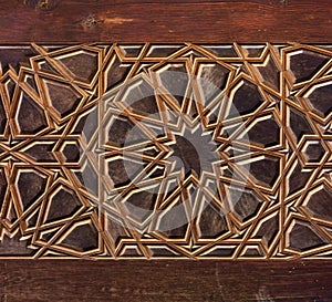 High res intense intricate arabesque relief decorated wood wall detail in Cairo photo