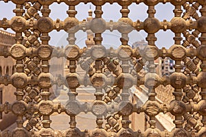 High res intricate arabesque intense inlaid wood window decorated wall from a mosque in Cairo