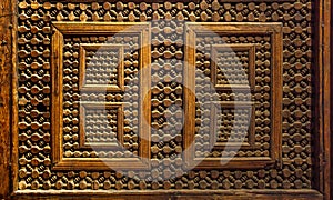 High res intricate arabesque intense wood panel relief close up decorated panel in Cairo, Egypt photo