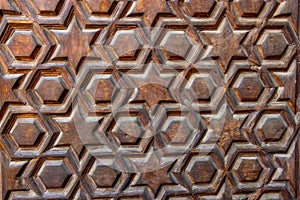 High res intricate geometrical arabesque intense relief on a wood in Cairo