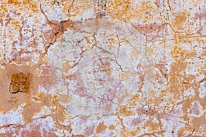 High res pale old weathered light brown tone semi smooth stone wall with cracks and white and yellow blotches