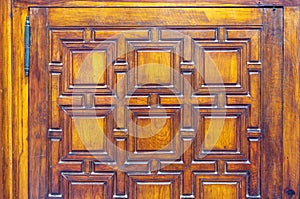 High res shining intricate arabesque geometrical intense reliefs on wood in Cairo, Egypt photo