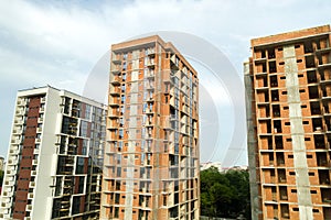 High residential apartment buildings under construction. Real estate development