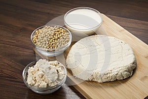 Food : Soy Milk, Soybeans,Okara and Tofu on Wooden Background