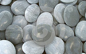 High-resolution image showcasing a detailed view of uniform gray pebble stones